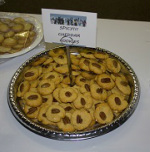 silver platter mounded with cheddar cookies