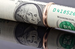 Dollar bill inside a ring