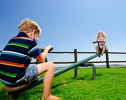 kids on a teeter totter