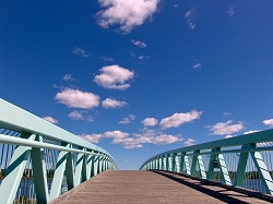 Clear bridge curving down out of sight