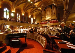 Church building with congregation singing