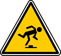Road sign with icon of man tripping