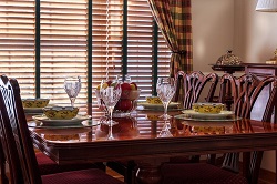 Highly polished table set with elegant china