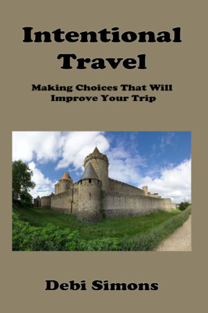 Cover for Intentional Travel showing the turreted fortress of Carcassonne